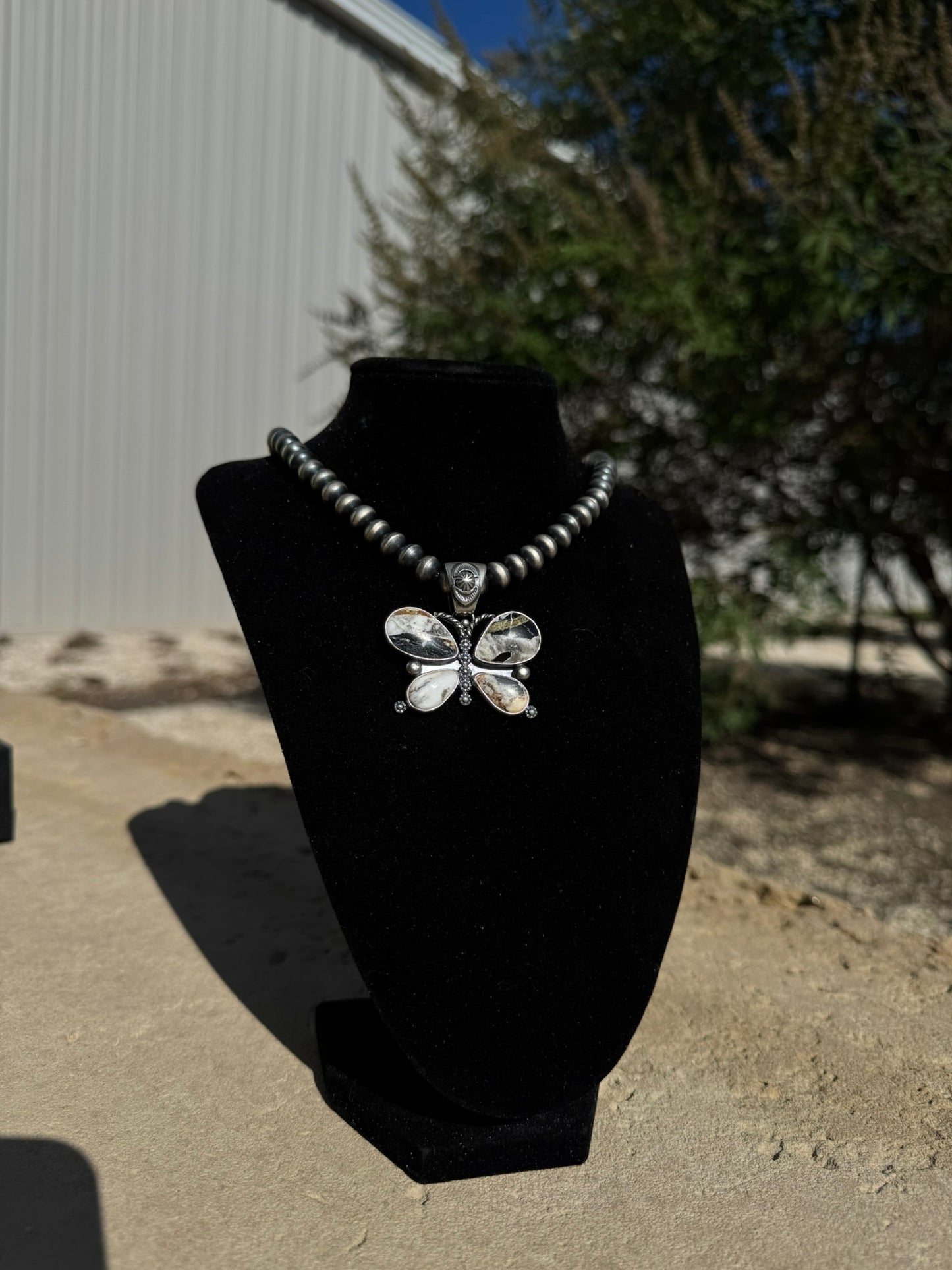 White Buffalo Butterfly Pendant